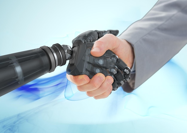 Business man shaking hands with robot