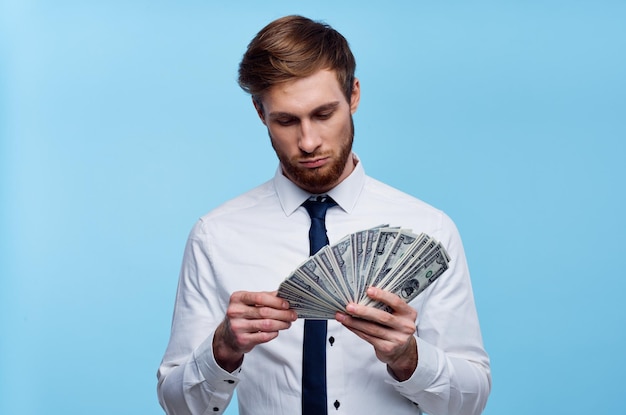 Business man in shirt with tie bundle of money finance wealth High quality photo