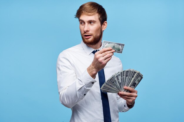 Business man in shirt with tie money finance autumn background cropped view