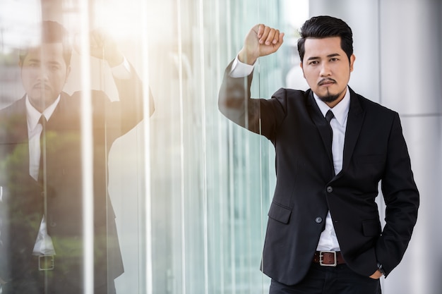 Business man standing in office