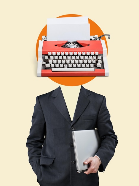 Business man in suit with typewriter on his head
