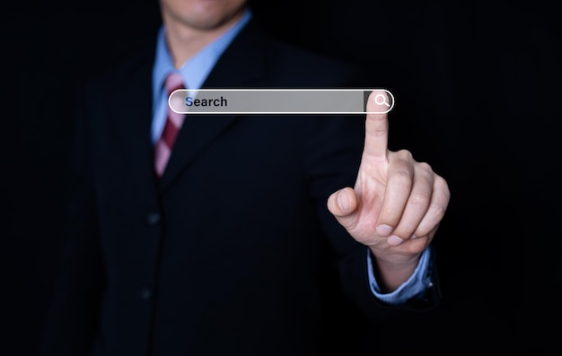 Business man touch search Engine for search data Searching for information condept