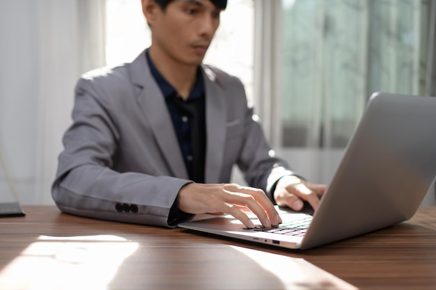 Business man use a computer to work