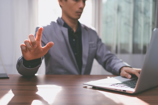 Business man use a computer to work