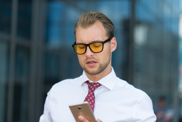 Business man using his cellphone