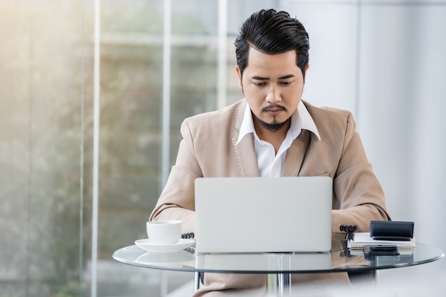 Business man using laptop computer