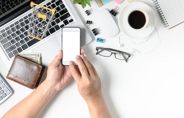 Business man using mobile phone for shopping online 