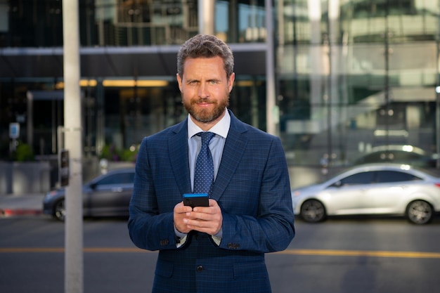 Business man using smartphone Businessman talking on phone