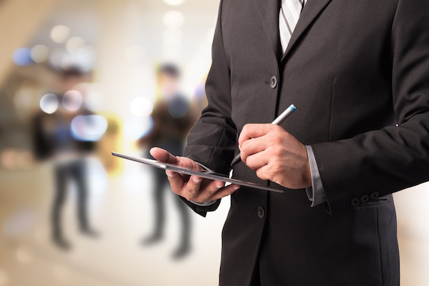 business man using tablet