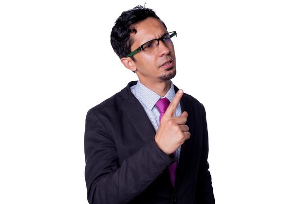 Business man wearing glasses and giving a presentation Stylish young adult latin man isolated on all white background