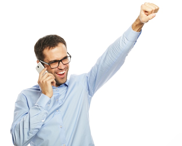 business man with mobile phone isolated over white background.