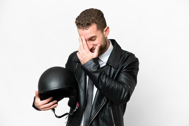 Photo business man with a motorcycle helmet over isolated white background laughing