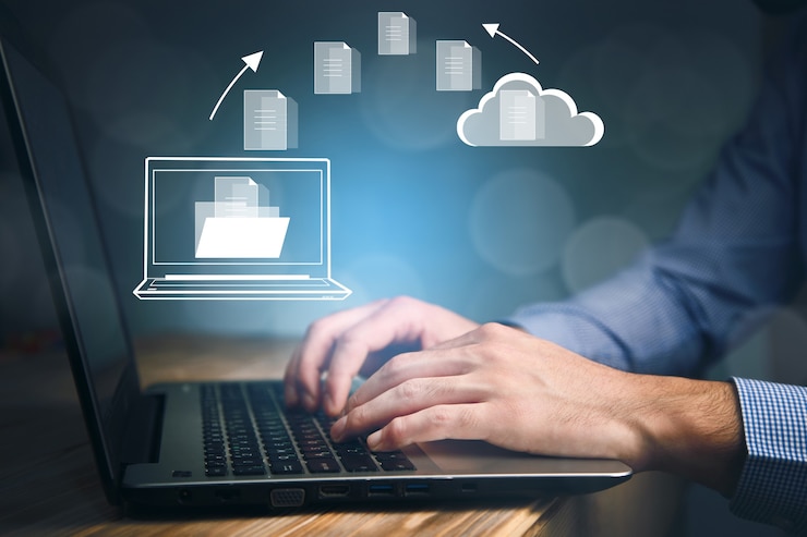 Photo business man working computer with file cloud icon
