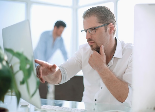 Business man working on a personal computer