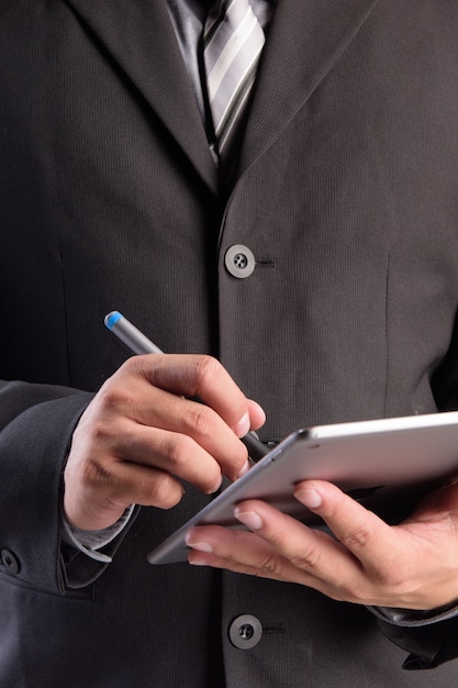 Business man working with a digital tablet 