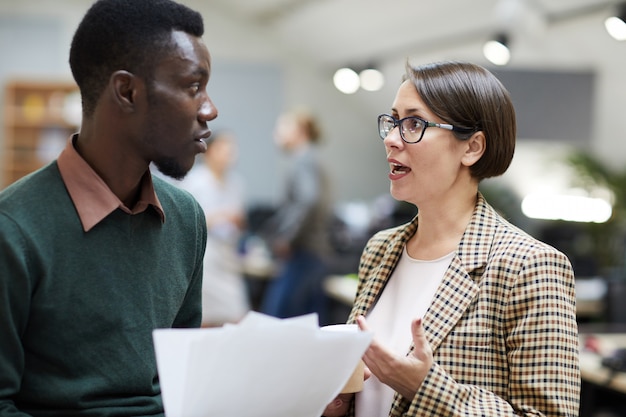 Business Manager Talking to Intern