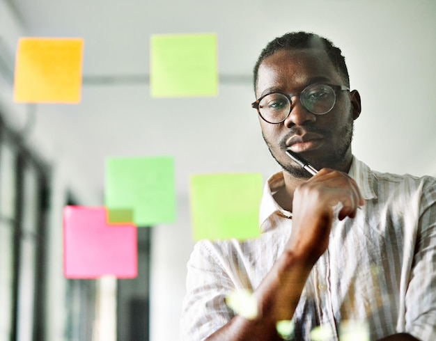 business meeting note paper man young office businessman strategy idea glass portrait success confident presentation startup sticky brainstorming creative