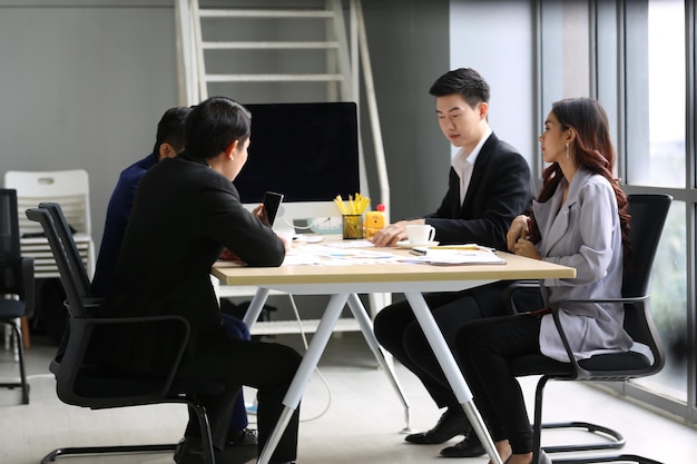 Business Meeting Talking With Colleagues In Office