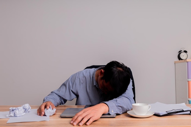 business men sitting at desks are very stressed