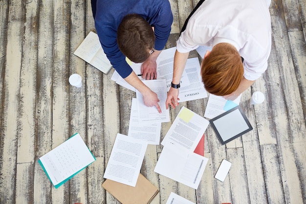 Business mess on floor in office