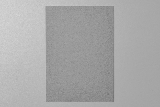 Business mock up grey sheet of paper on grey background