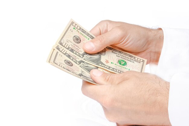 Business Money dollars in the hands on a white background