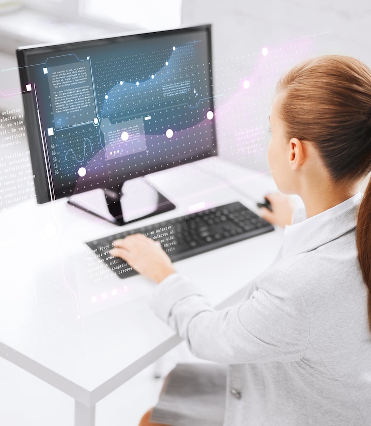 Photo business, money, office and future technology concept - businesswoman on computer in office