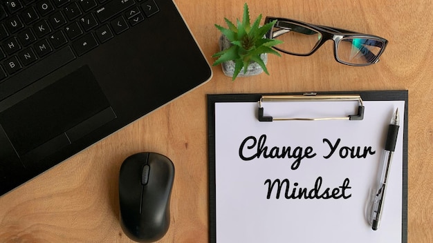 Photo business motivational quotes - change your mindset on a piece of paper