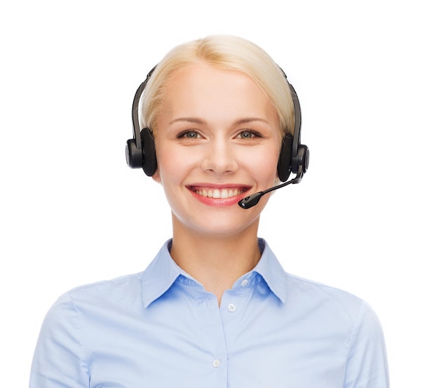 business and office concept - friendly female helpline operator with headphones