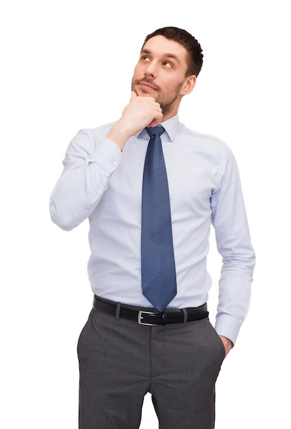 business and office concept - handsome buisnessman looking up