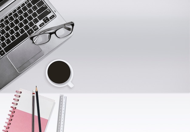 Business office workplace, Education concept. Laptop and notebook with coffee cup 