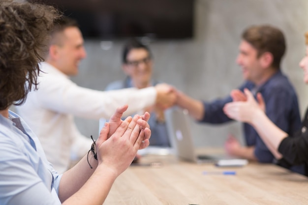 Photo business partner shake hands on meetinig in modern office building