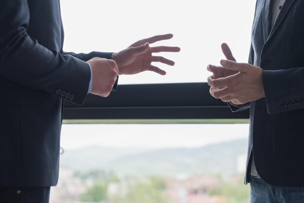 Business Partner Shake Hands on meetinig in modern office building