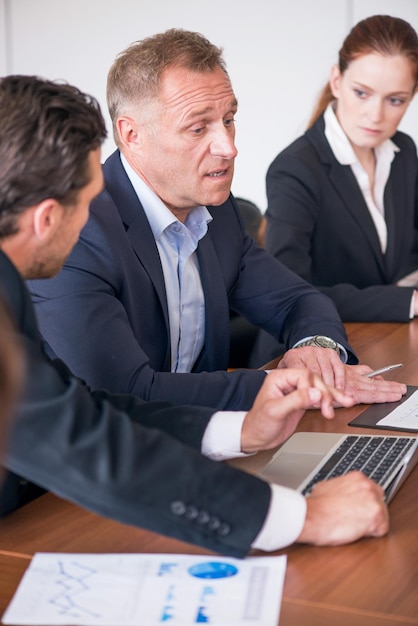 Business partners discussing documents