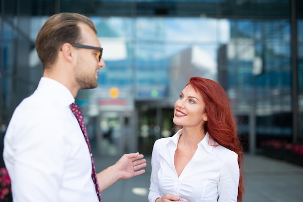 Business partners discussing outdoors