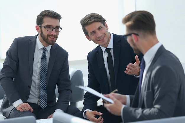 Business partners discussing the terms of the new contractphoto with copy space