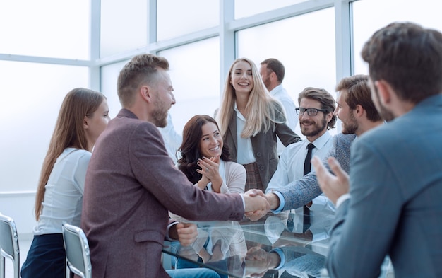 Business partners greeting each other with a handshake