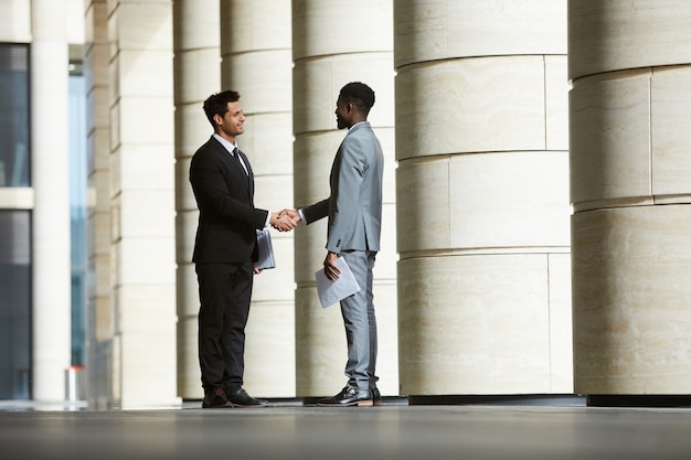 Business partners meeting outdoors