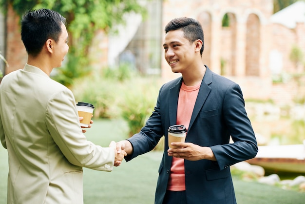 Business partners meeting outdoors