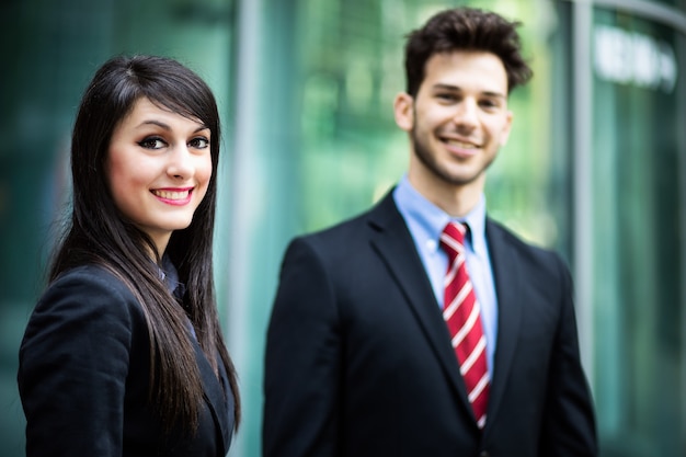 Business partners outdoor smiling confidently