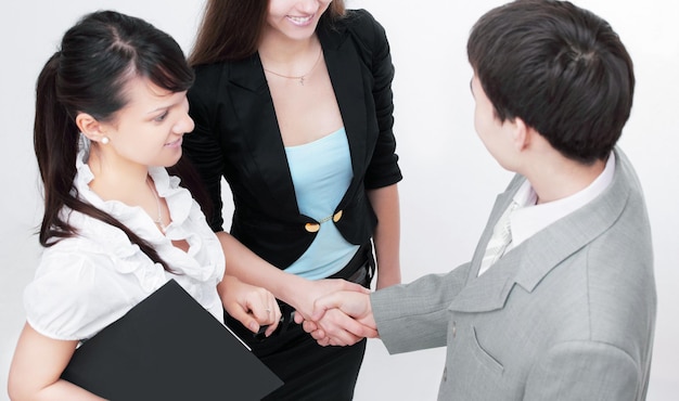 Business partners shake hands before the talks