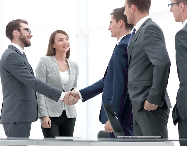 Business partners shaking hands