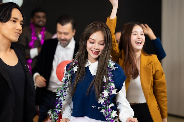 Business party and success celebration Group of diverse business people colleagues or employees dance Applause clapping at event party achievement