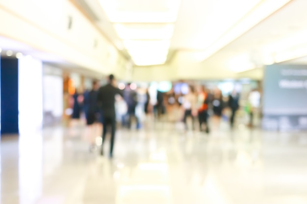 Business people activity standing and walking in the lobby blurred.