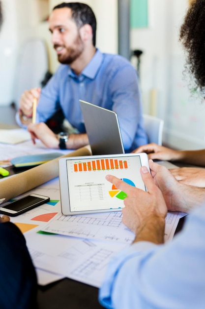 Photo business people analyzing data in office