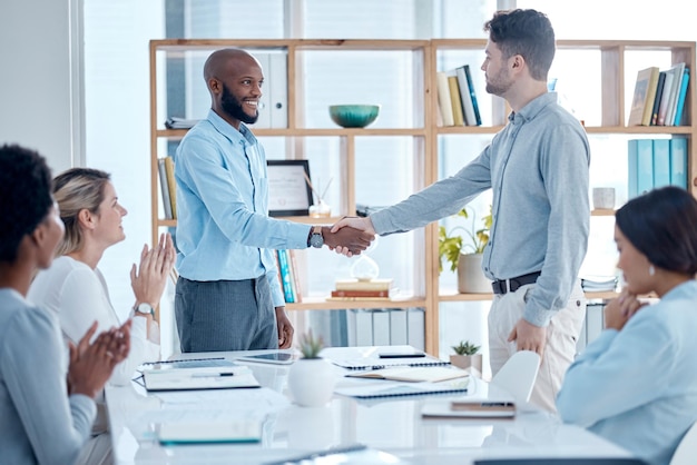 Business people applause and handshake for partnership deal or collaboration Welcome clapping and group of employees shaking hands for agreement b2b or congratulations opportunity and meeting