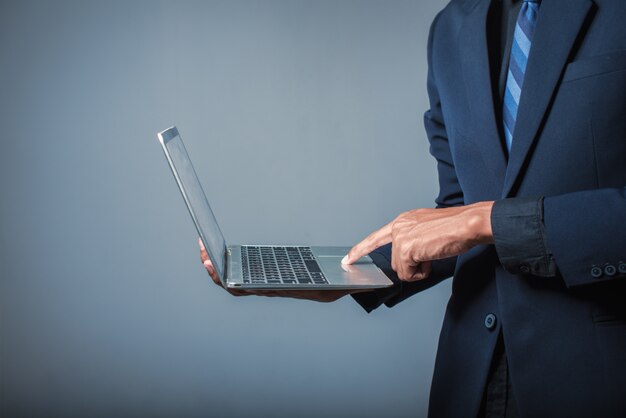 Business people are touching laptop screens