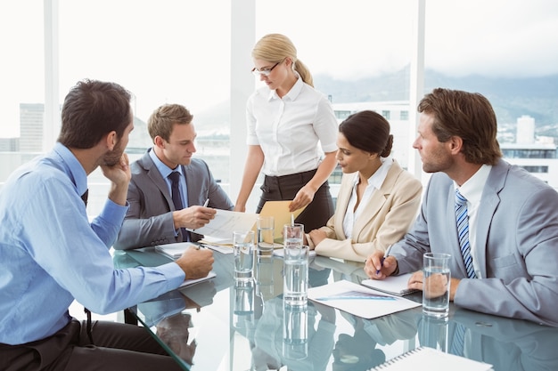 Business people in board room meeting