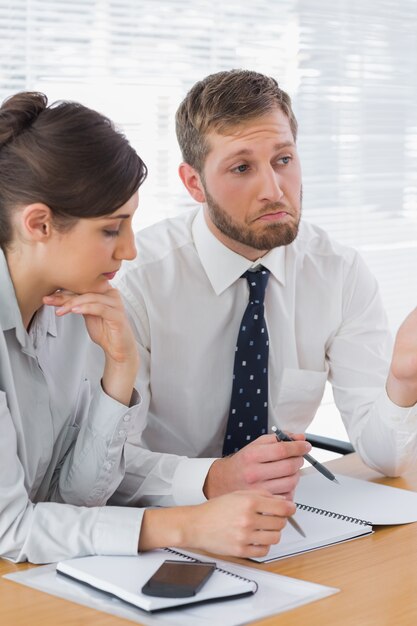 Business people chatting over documents