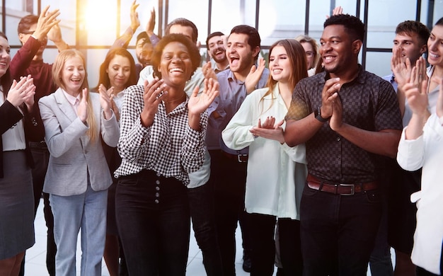 Business people clapping their hands after a seminar